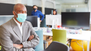 business man with mask on